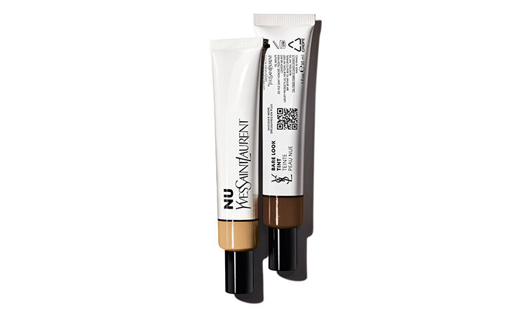 Two tubes of makeup from Yves Saint Laurent, one in light beige and the other in dark brown, displayed against a white background.