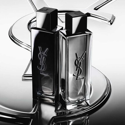 Zwei YSL-Parfumflakons in Schwarz und Silber